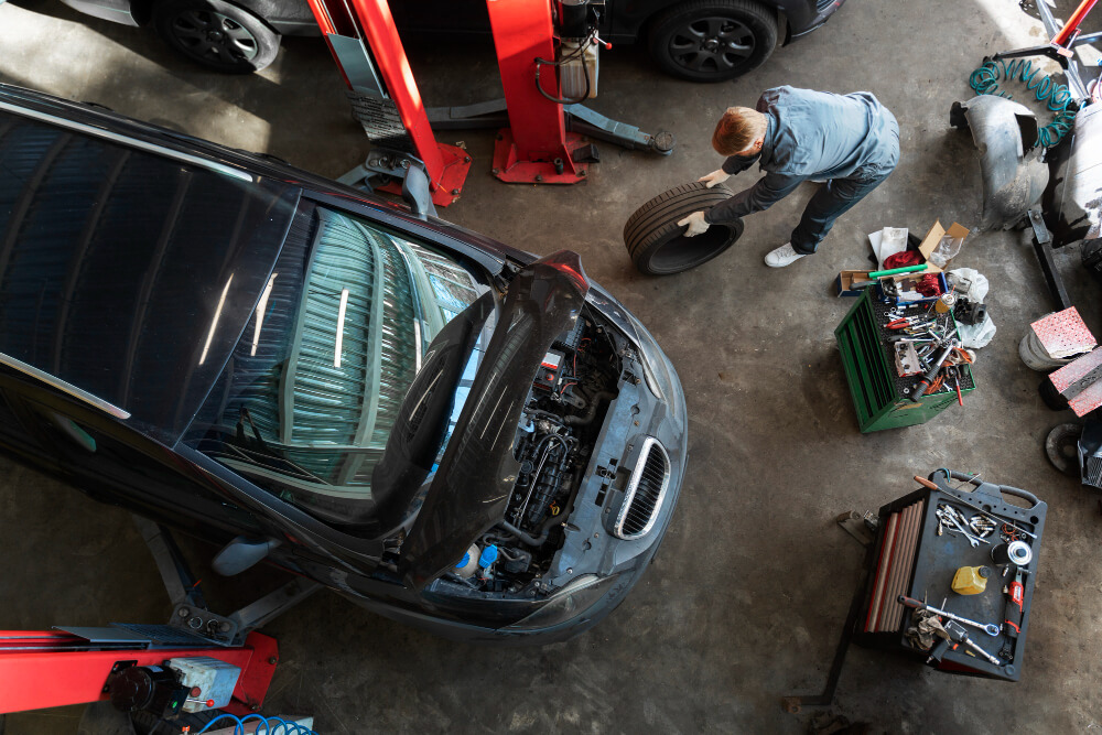 inspecting-vehicle-frame-after-collision