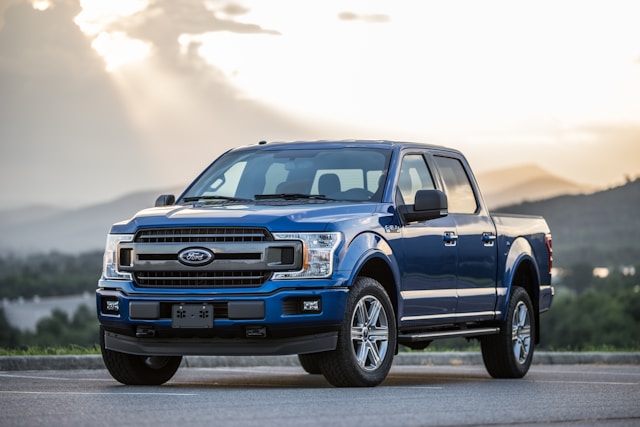 OEM Ford bumper and grille parts prepared for installation