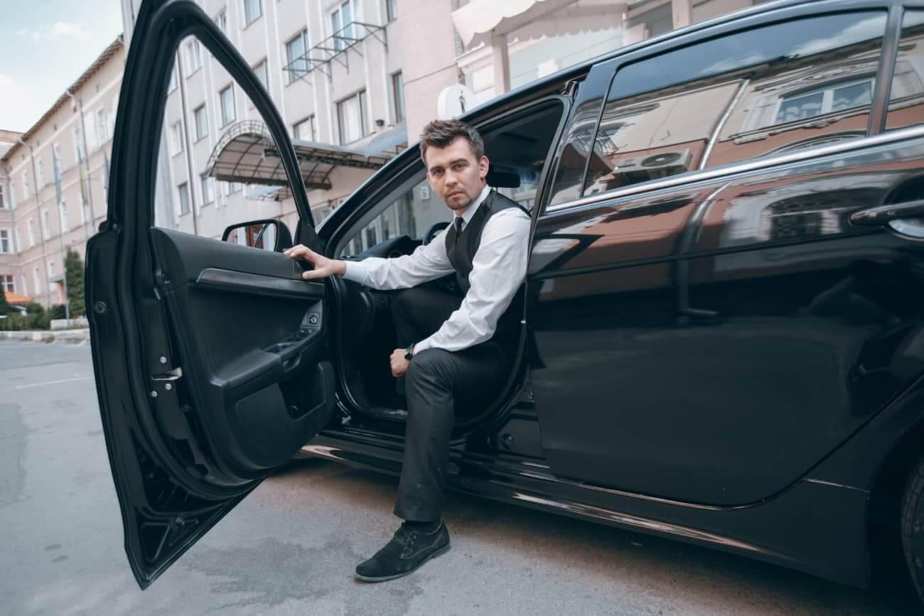 Driver getting out of car
