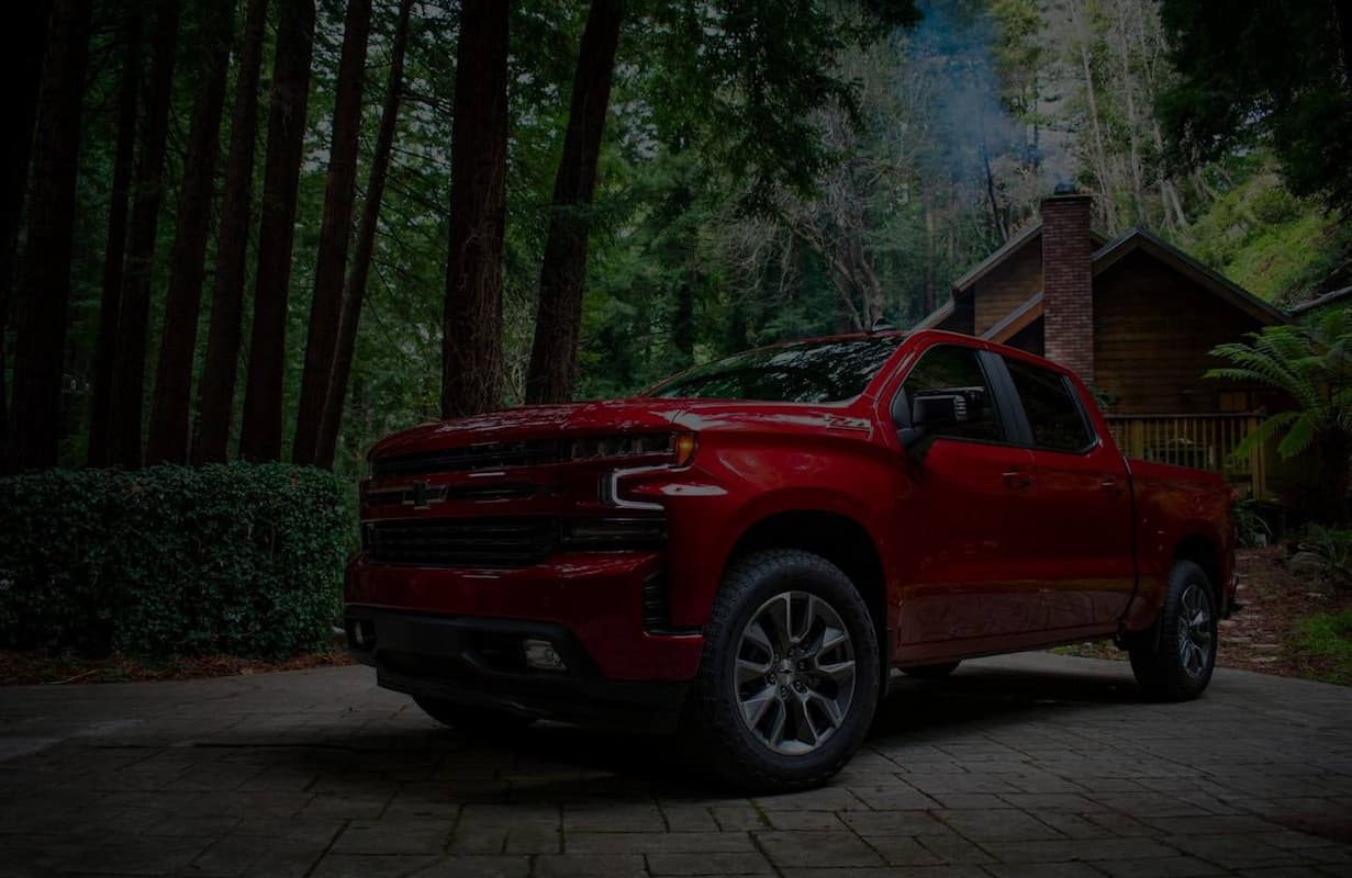 Red car in the forest